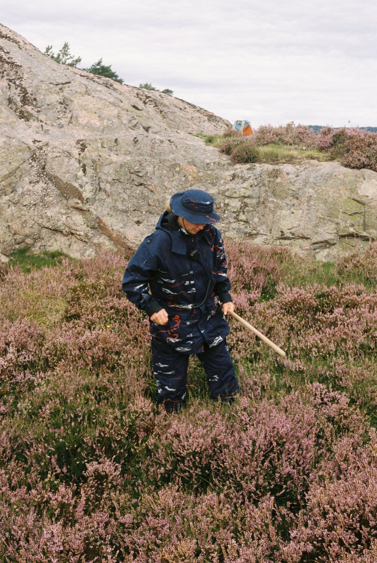 Figure among heather on the headland, Dybingen II